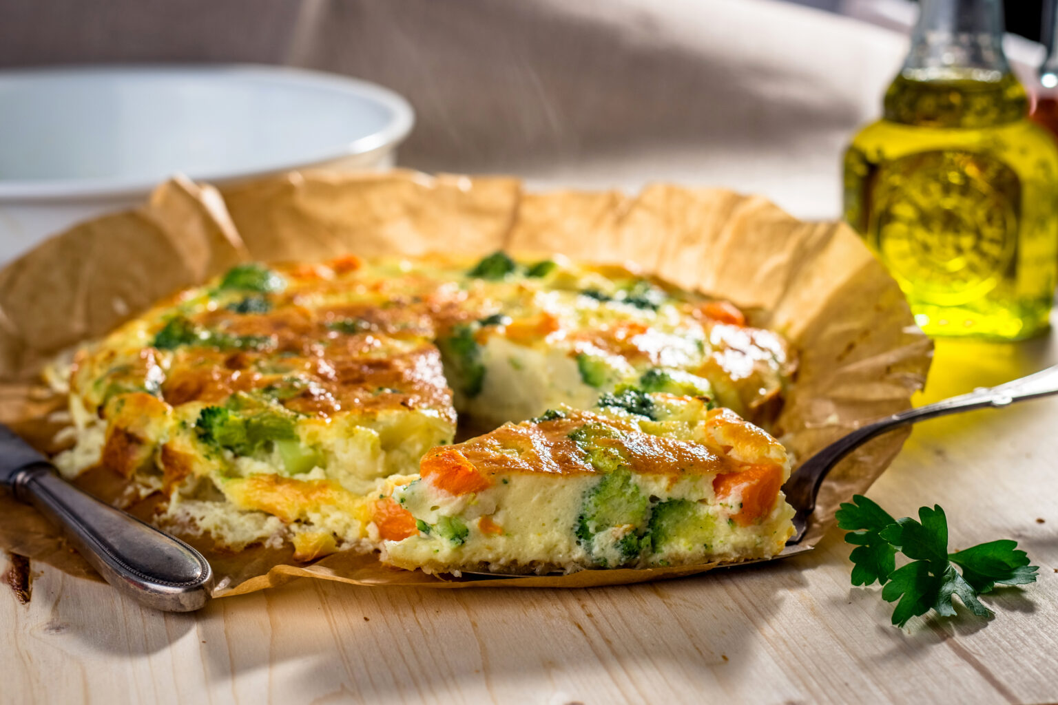 Homemade vegetable  quiche on wooden background