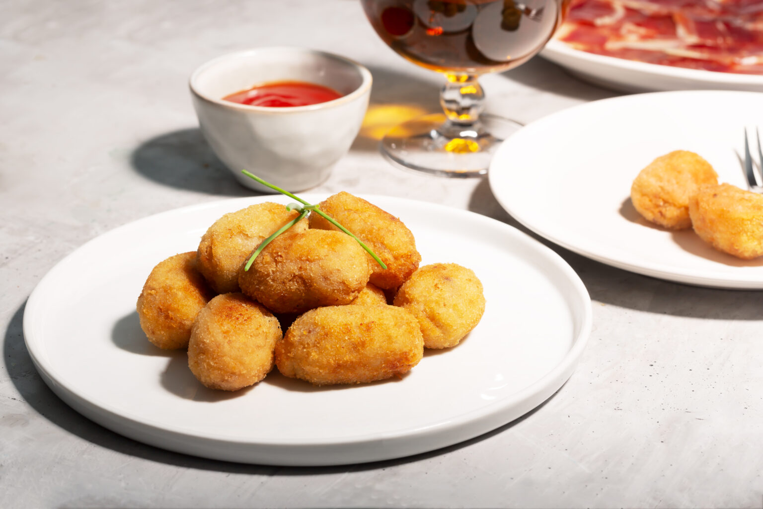 Tapas croquettes, traditional Spanish snack usually prepared with mashed potatoes, meat or vegetables