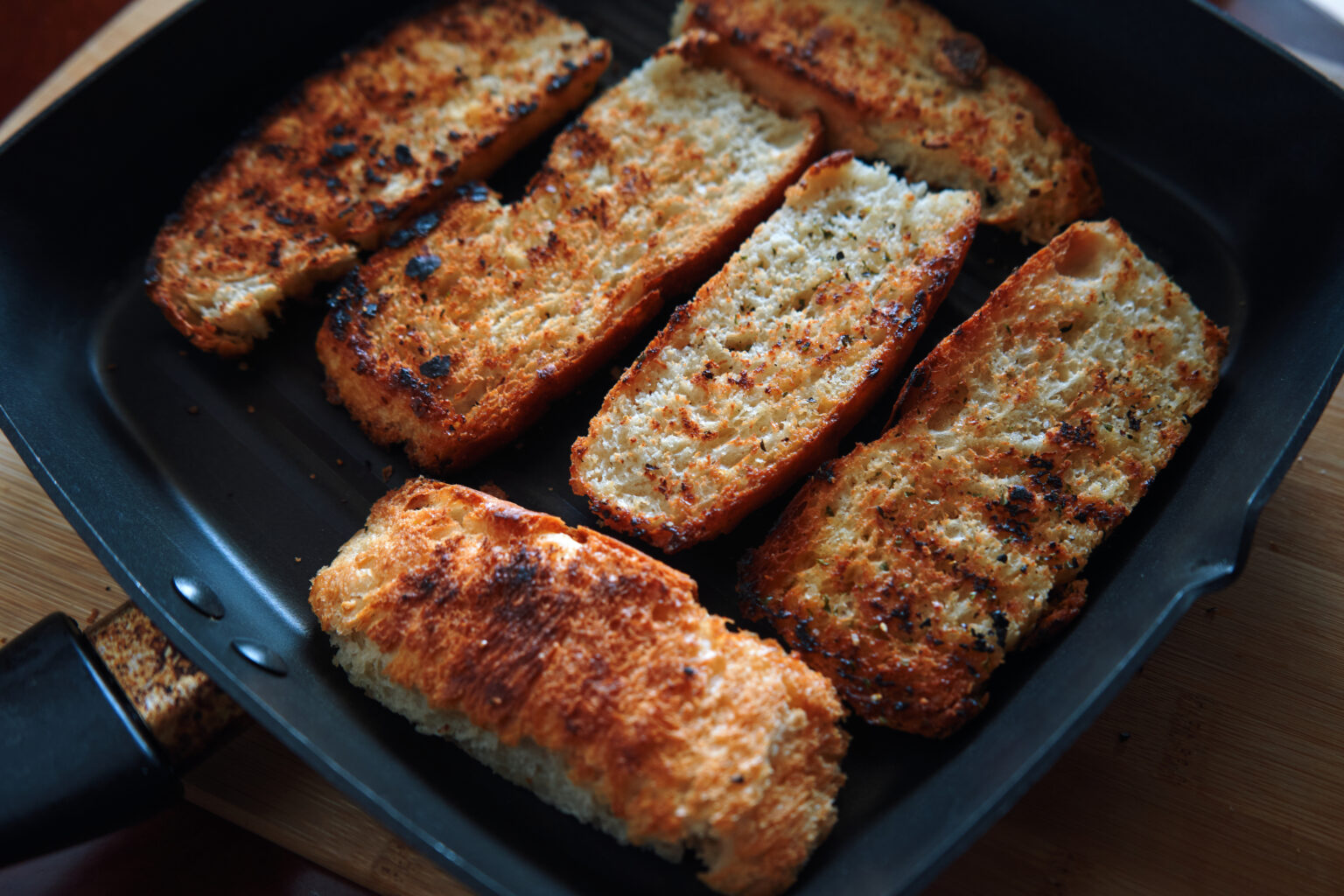 the-crispy-seared-bread-in-the-skillet-9ARBQRN