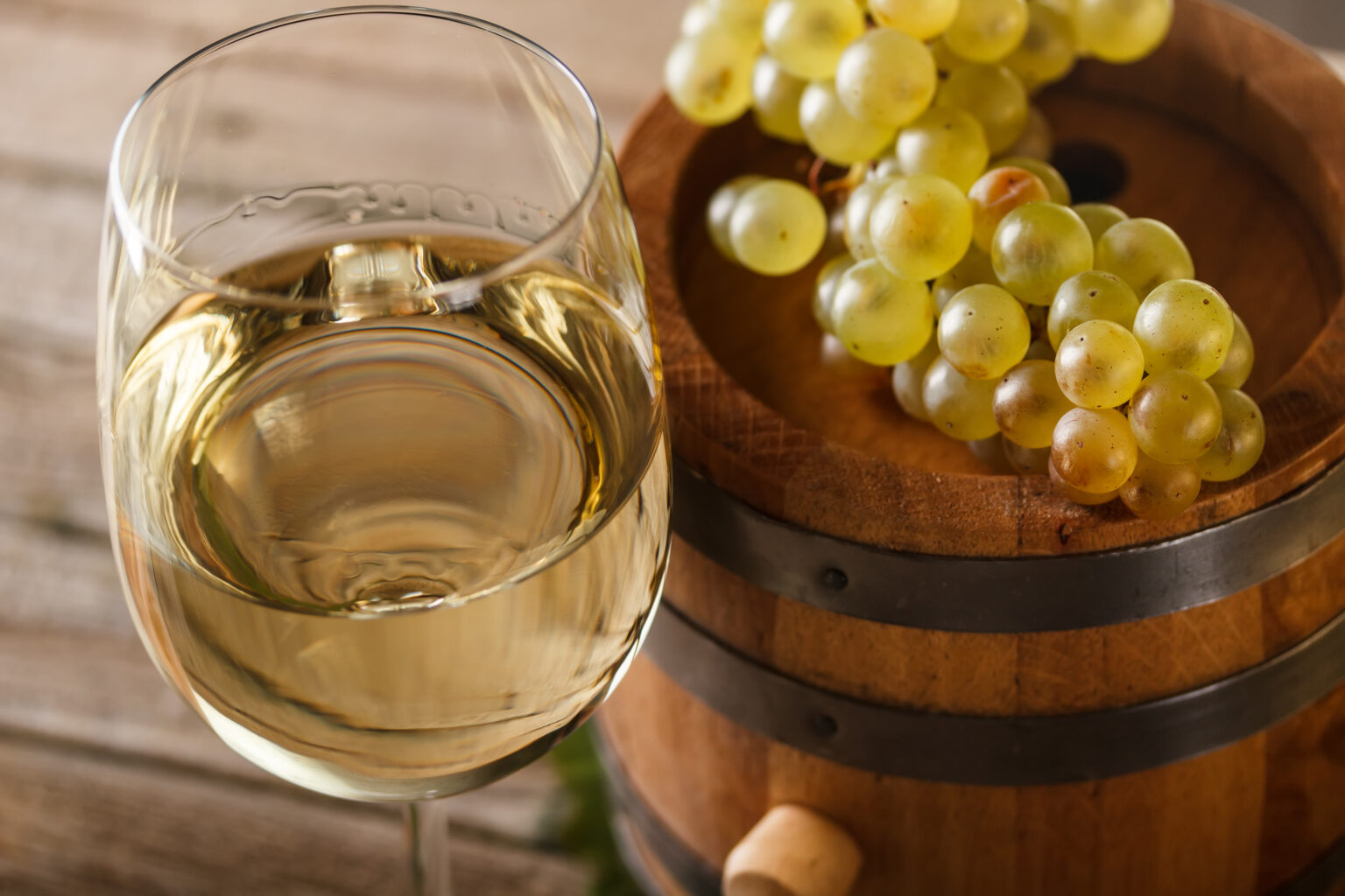 Still life with wine glass and barrel