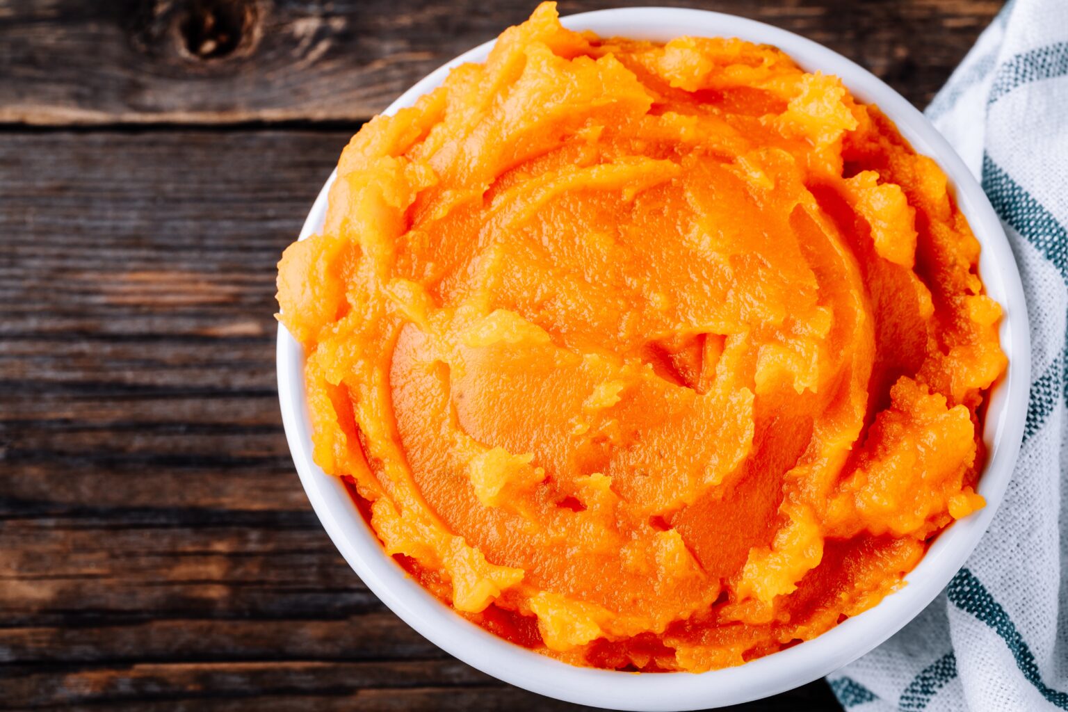 Organic Orange Pumpkin Puree. Baked butternut squash in bowl