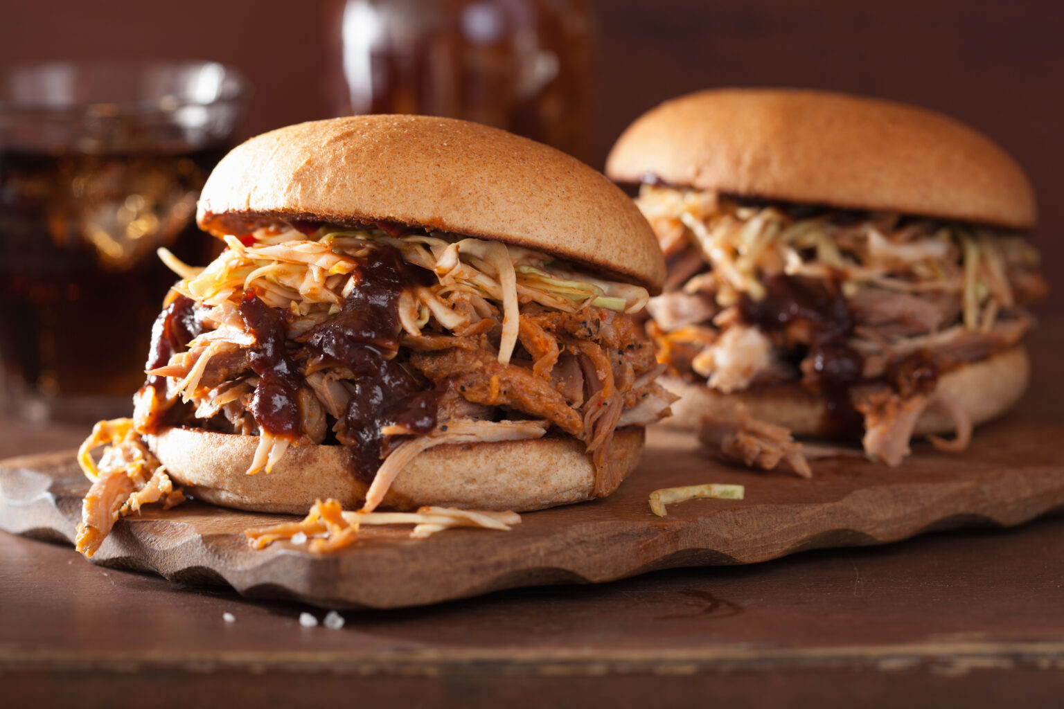 homemade pulled pork burger with coleslaw and bbq sauce