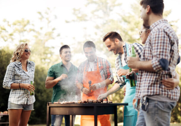Friends camping and having a barbecue